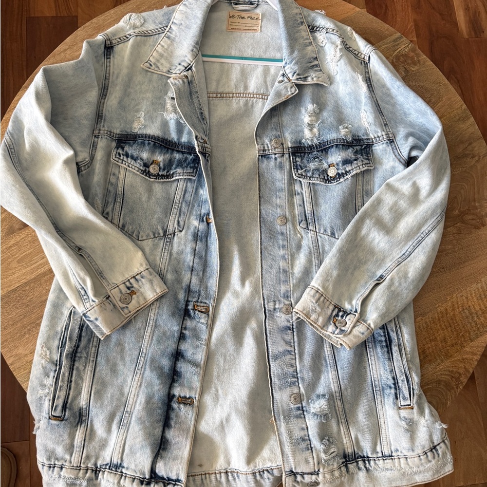 We The Free Long and Lean destroyed denim trucker jacket